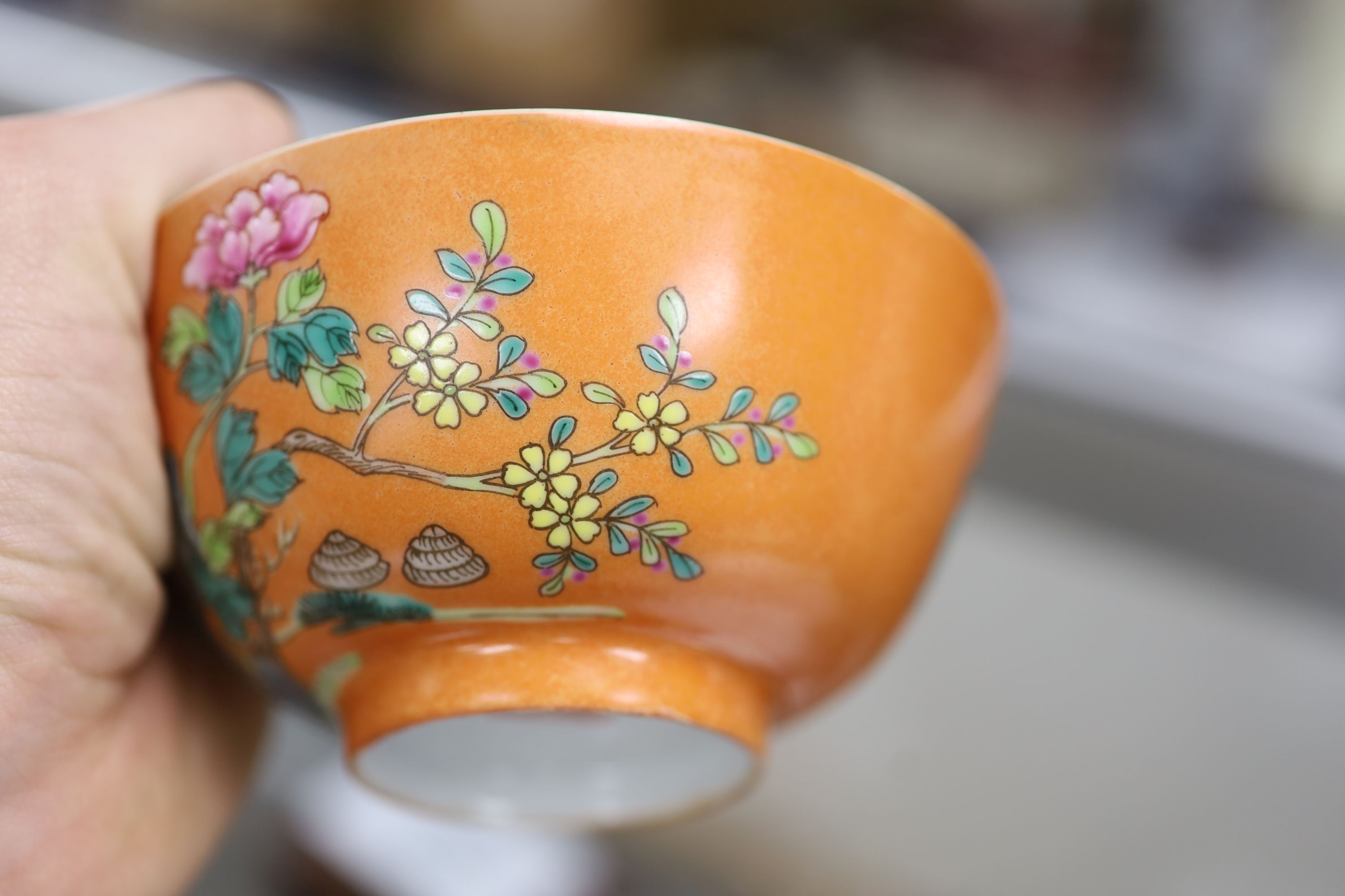 A Chinese orange ground bowl, diameter 11.5cm